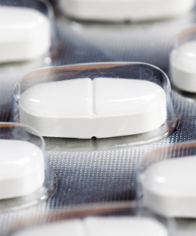 white pharmaceutical pill in blister pack
